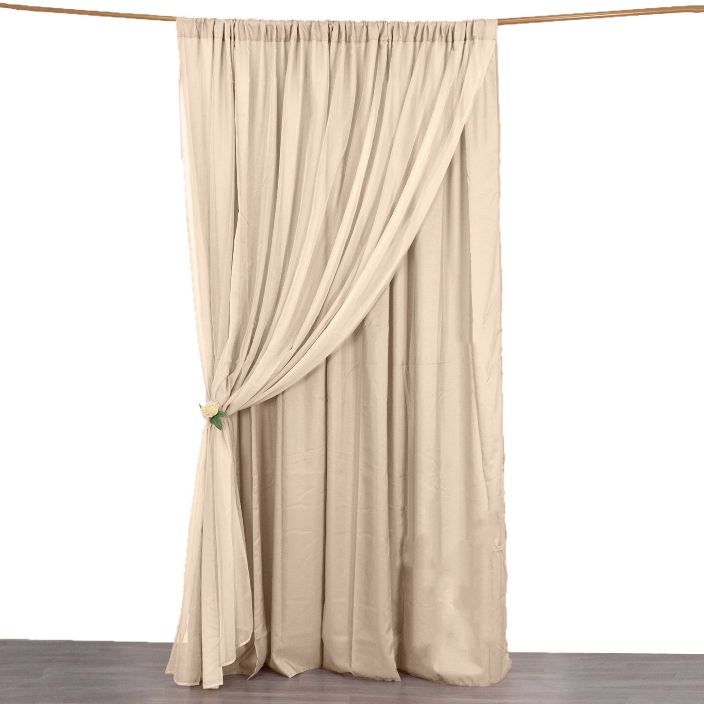 Nude chiffon polyester event curtain drapes with rod pockets.