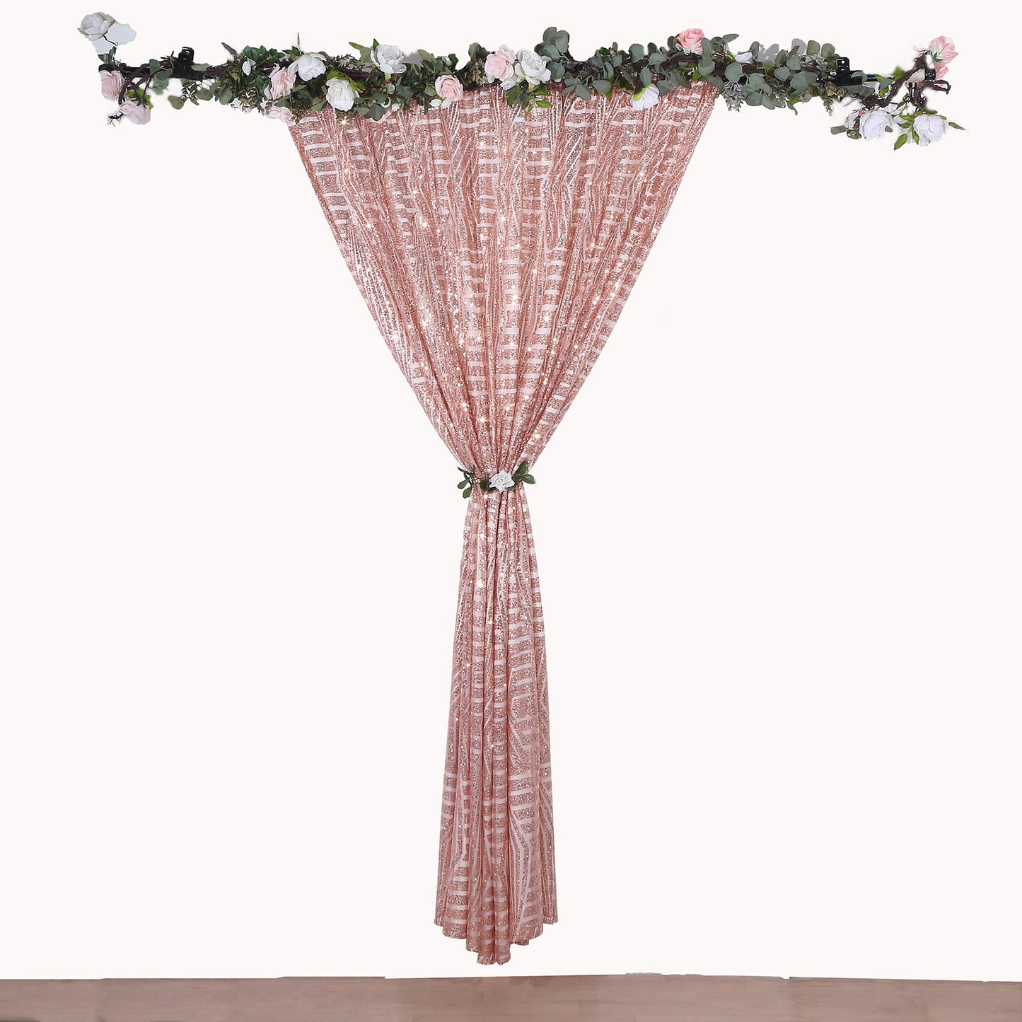 Rose gold sequin curtain drapes with satin backing and floral accents.