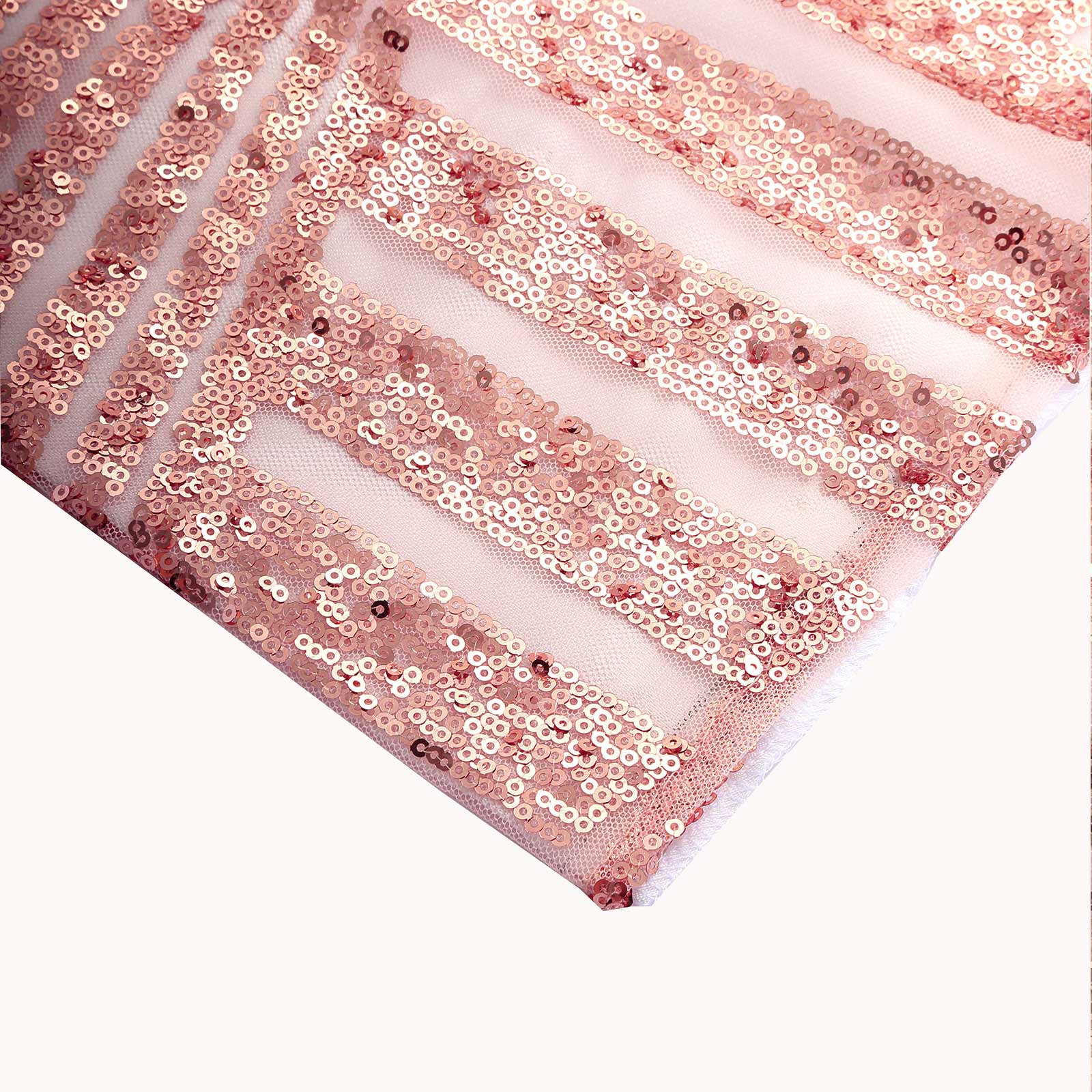 Rose gold geometric sequin backdrop with satin backing.