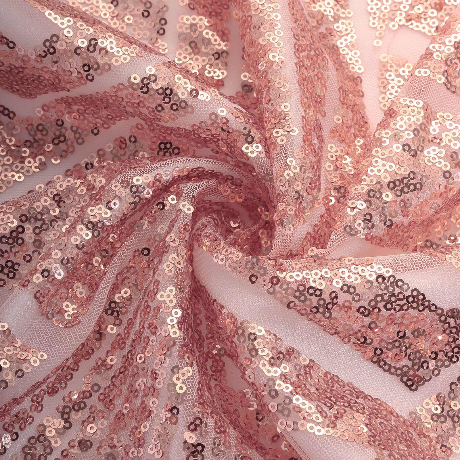 Rose gold geometric sequin backdrop drape with satin backing.