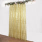 Gold geometric sequin event curtain drapes with satin backing.
