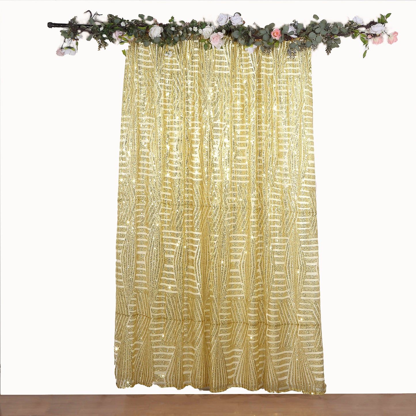 Gold geometric sequin curtain drapes with satin backing and sparkly backdrop.
