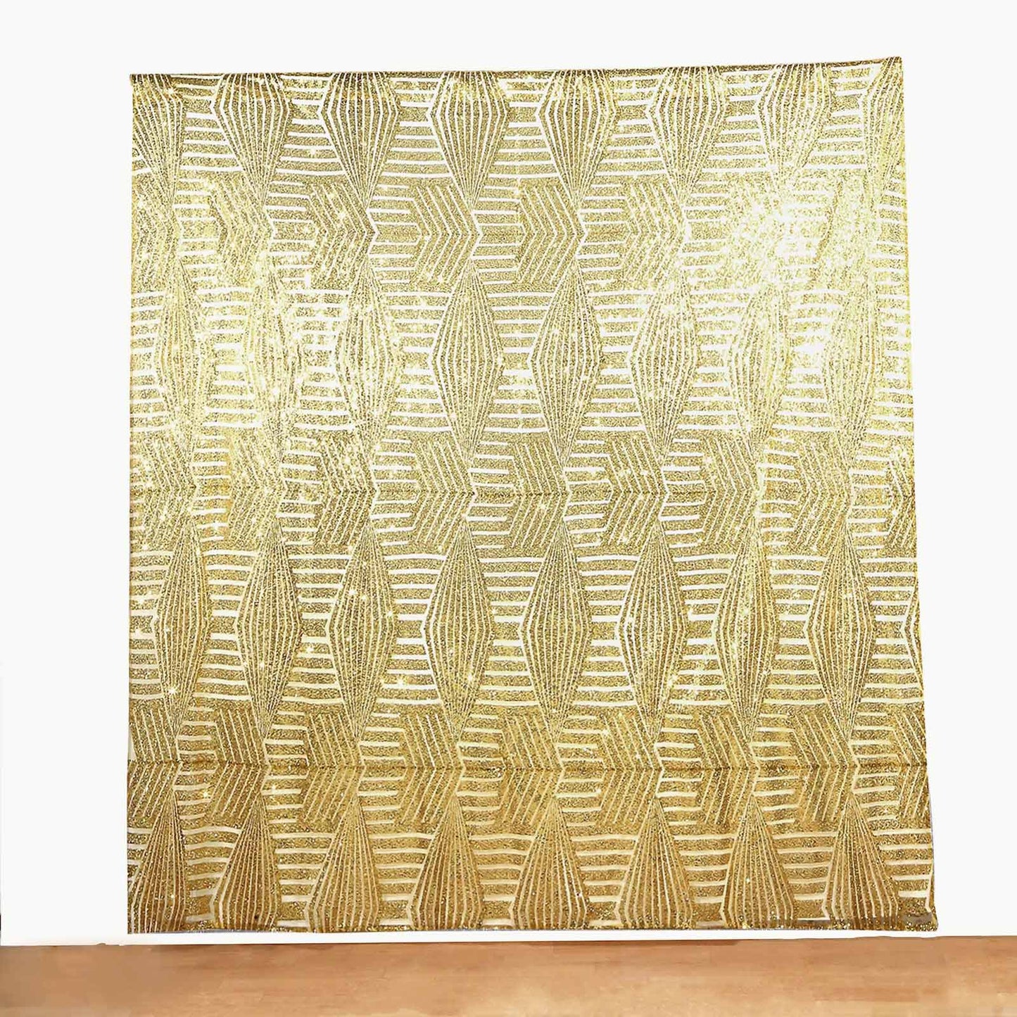 Gold geometric sequin event curtain drapes with satin backing.