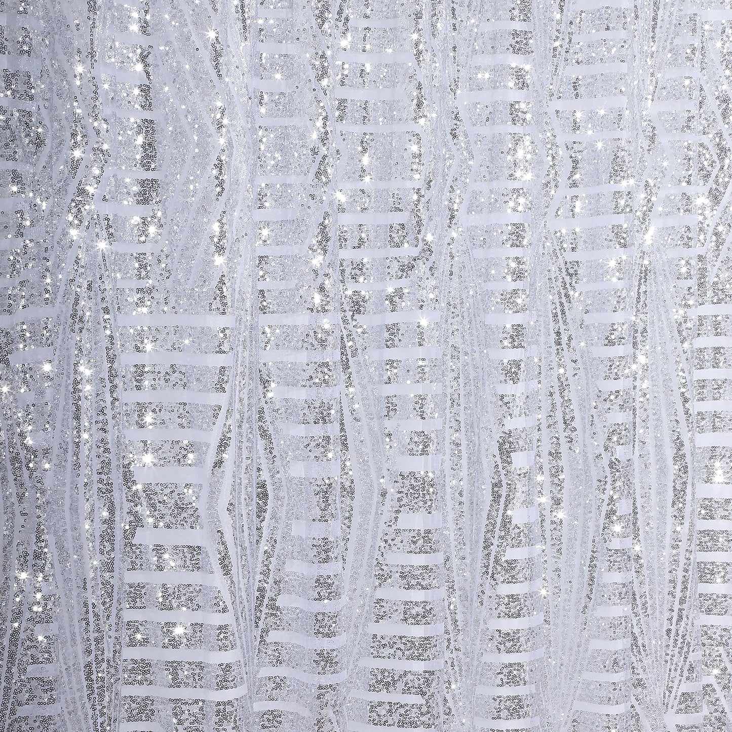 Silver geometric sequin event curtain drapes with satin backing.