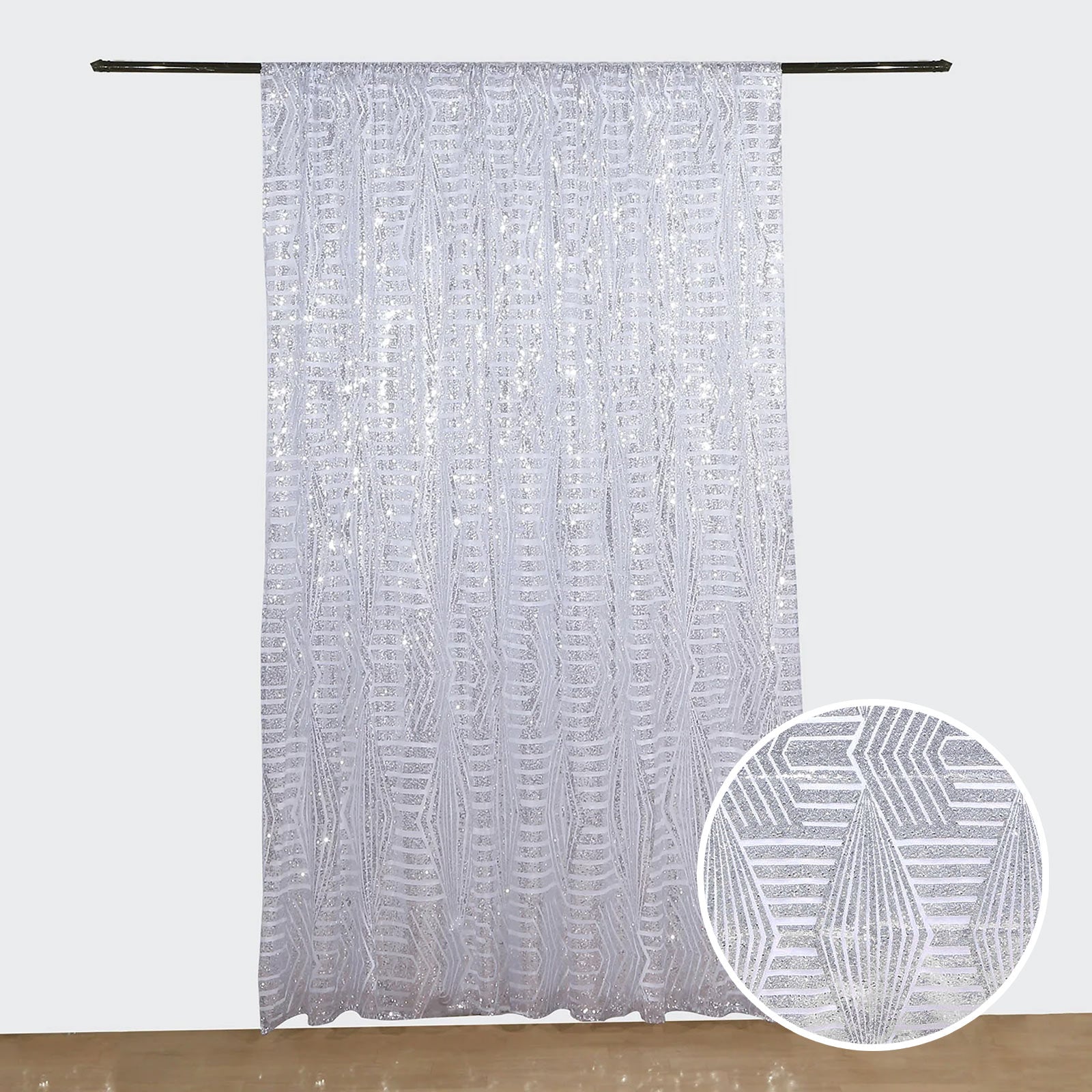 Silver geometric sequin event curtain drapes with satin backing.