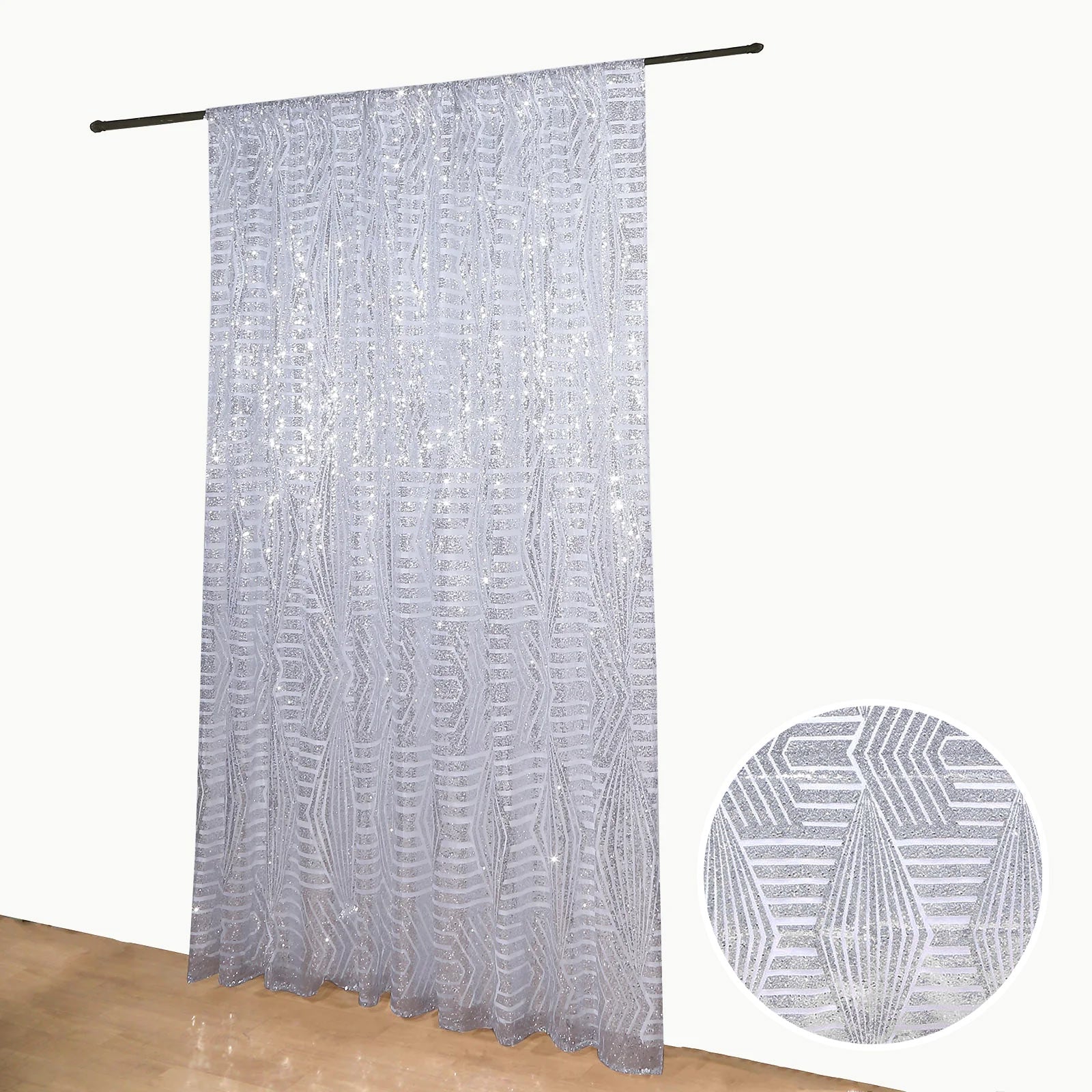 Silver geometric sequin event curtain drapes with satin backing.