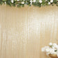 Gold sequin backdrop curtain with shimmering drape for events and photo booths.