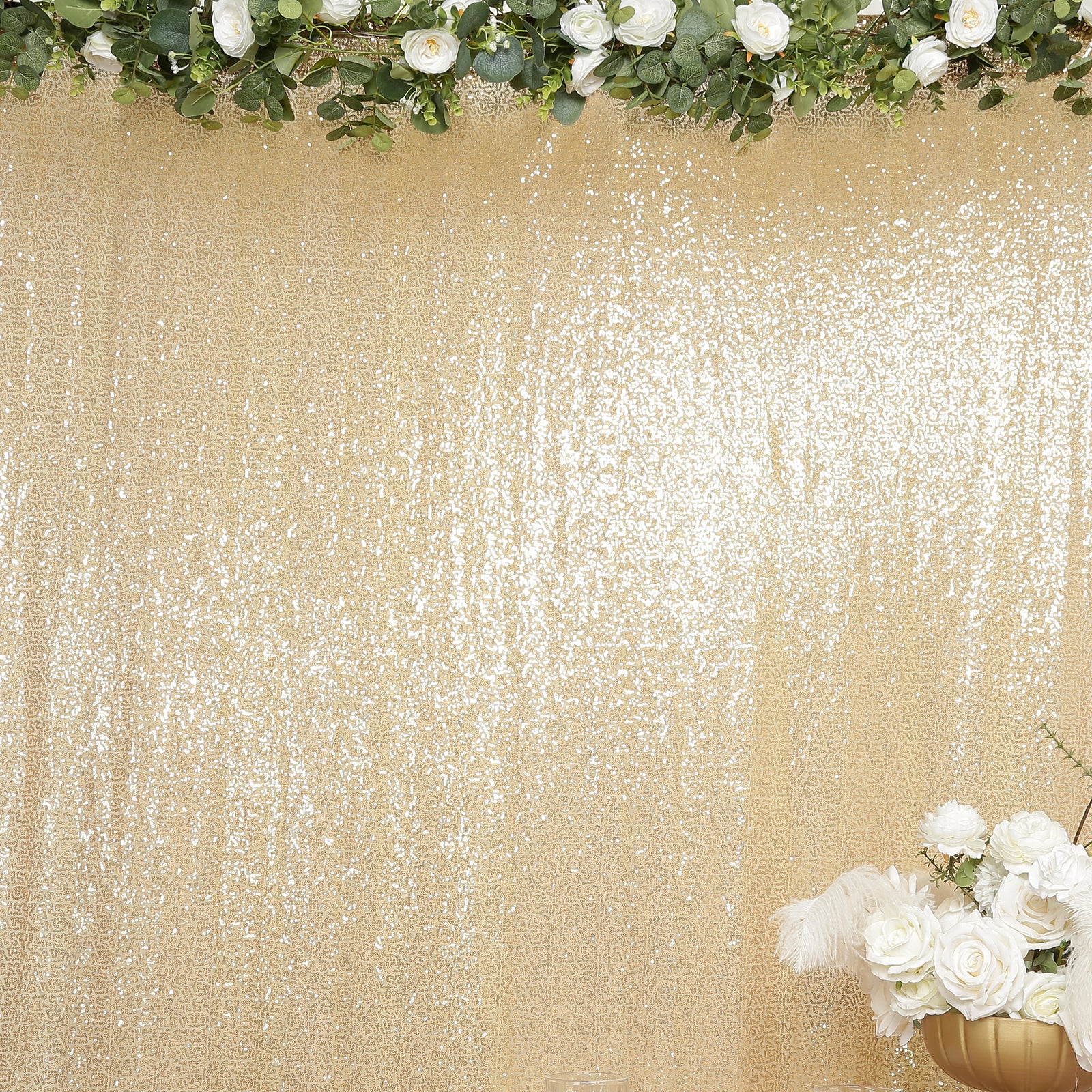 Gold sequin backdrop curtain with shimmering drape for events and photo booths.