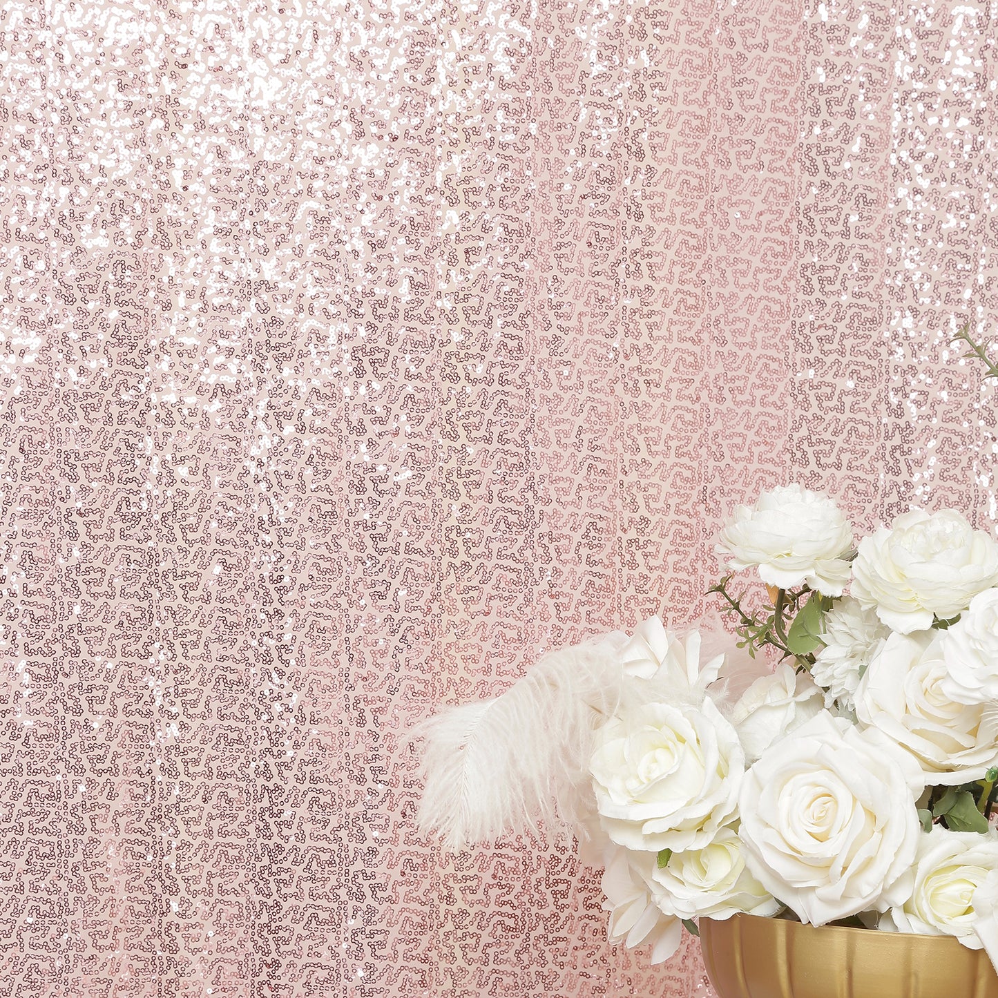 Pink sequin backdrop curtain with shimmering drape panel for events.