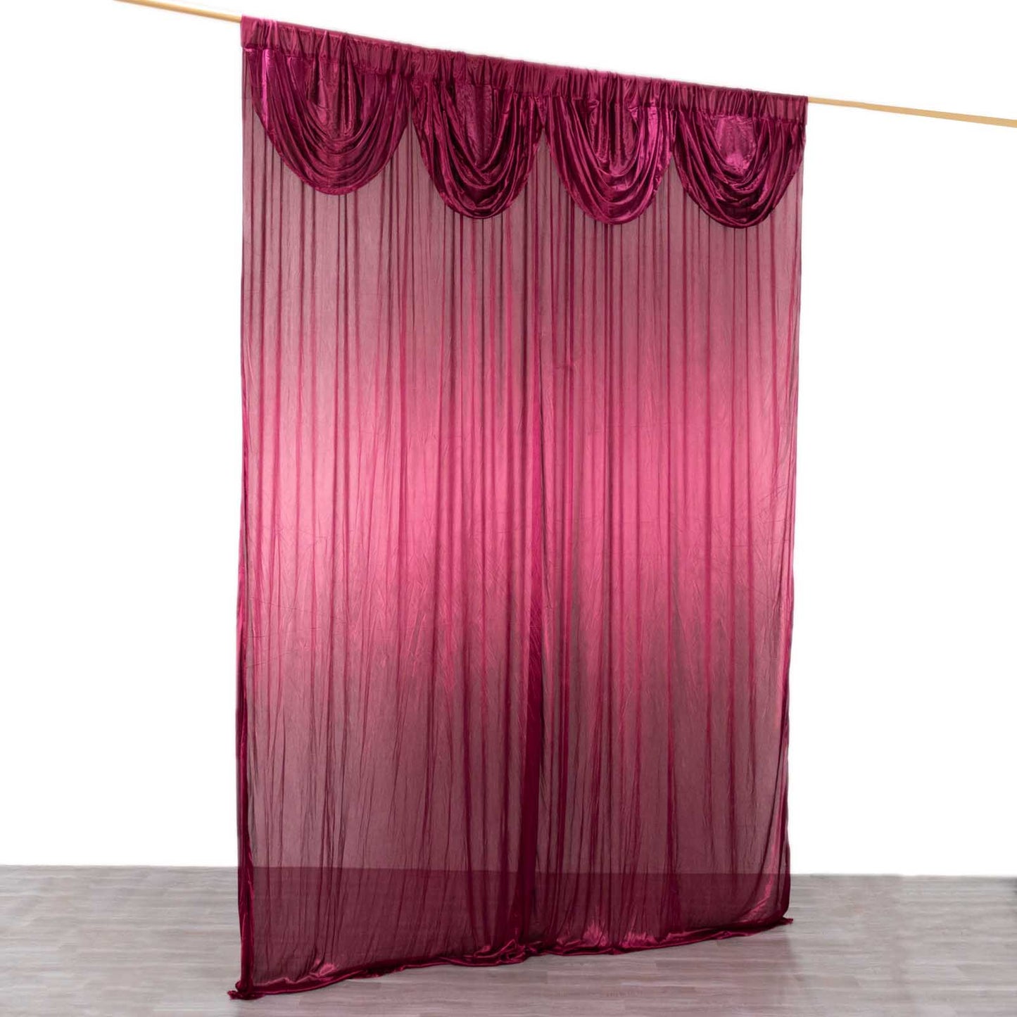 Burgundy pleated satin event curtain drapes for photo backdrop.