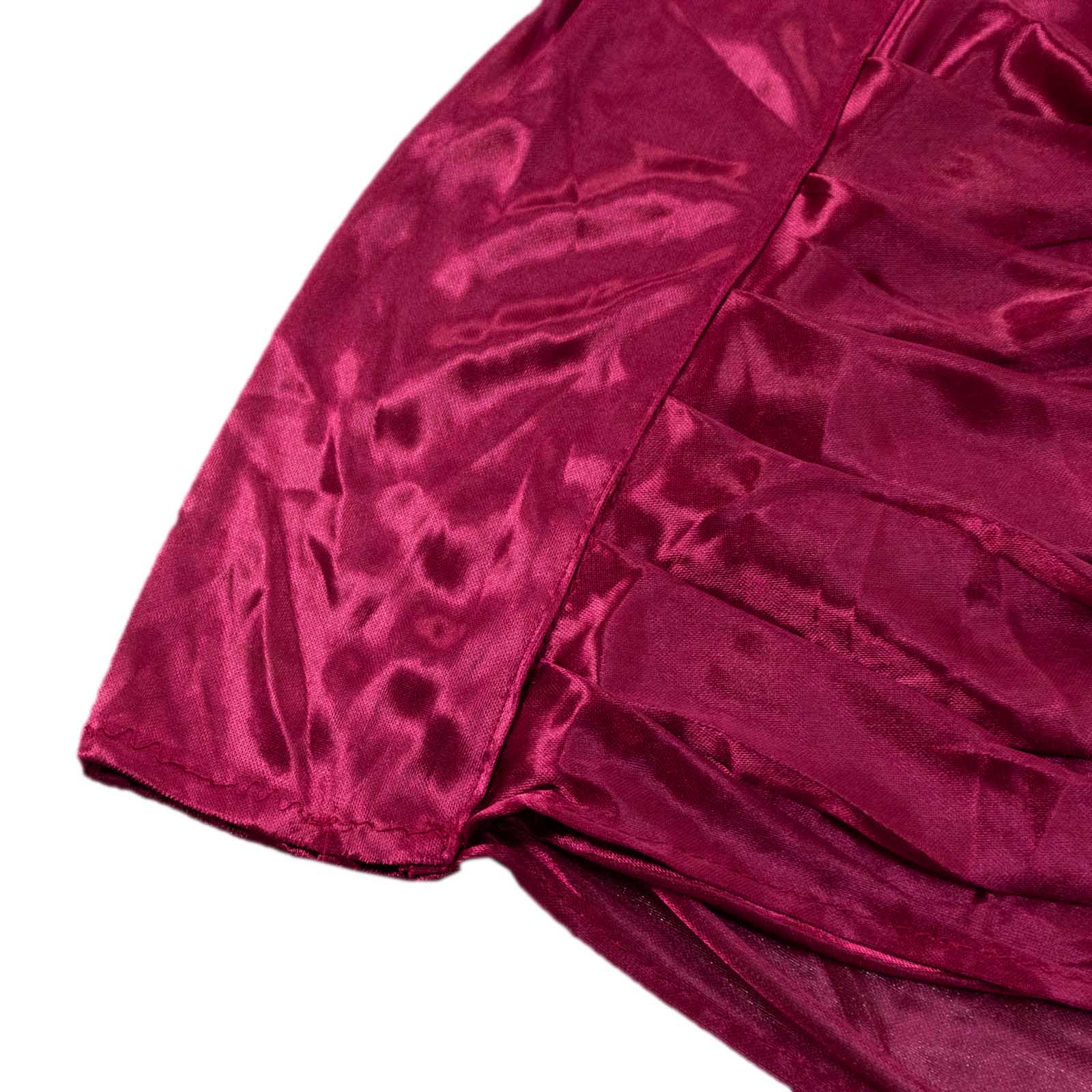 Burgundy pleated satin event curtain drape, glossy photo backdrop panel.