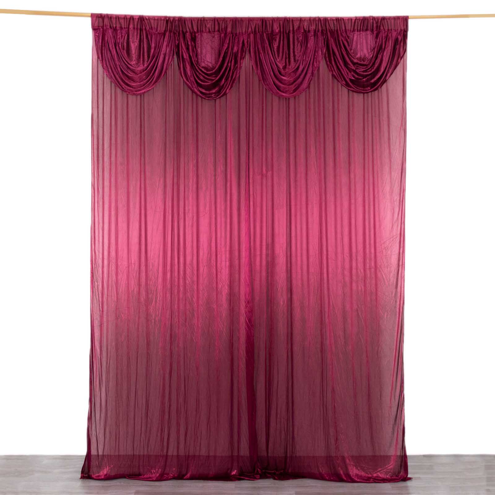 Burgundy pleated satin event curtain drapes for glossy photo backdrop.