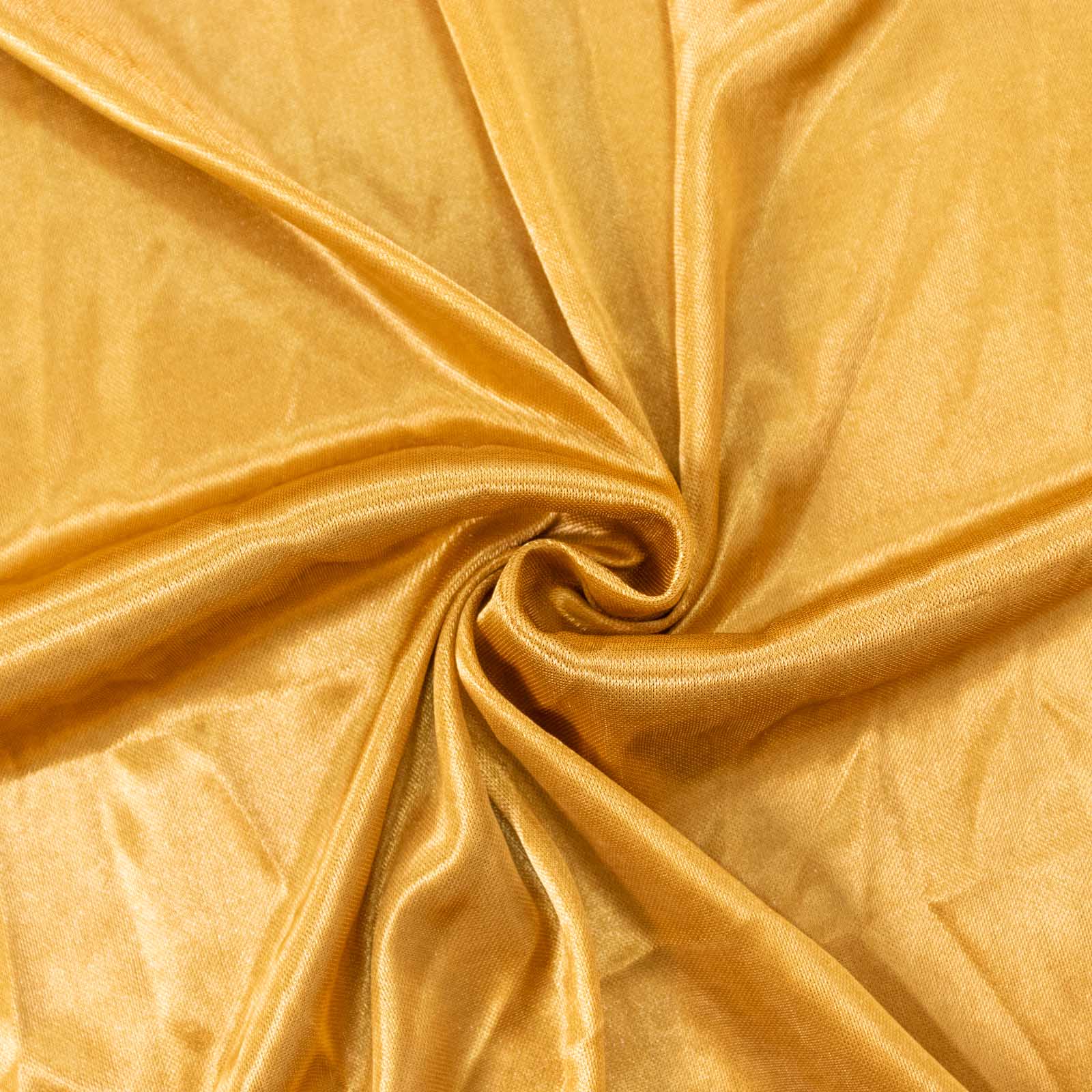 Gold satin drape fabric, perfect for event backdrops and decorations.