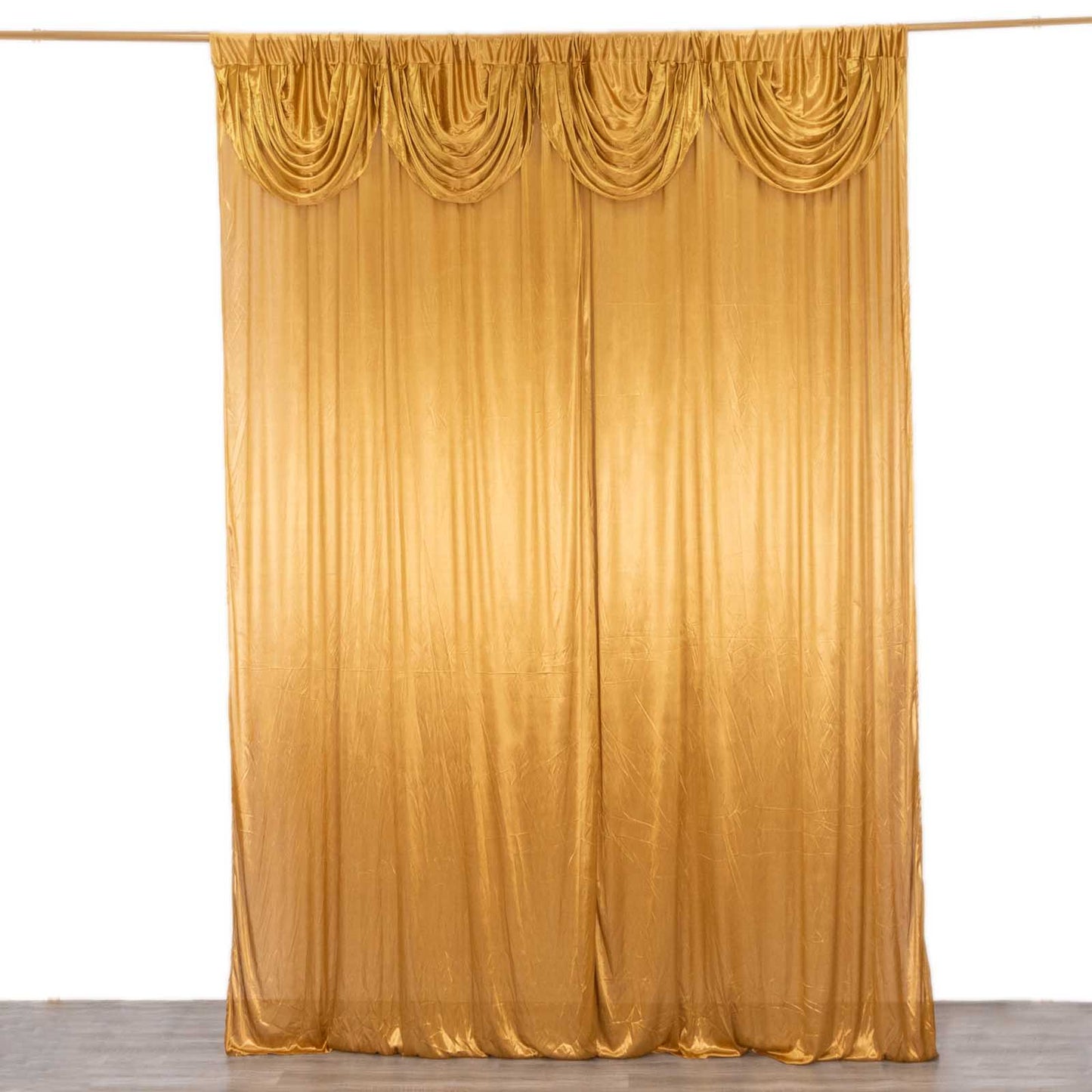 Gold satin event curtain drapes, glossy photo backdrop panel.