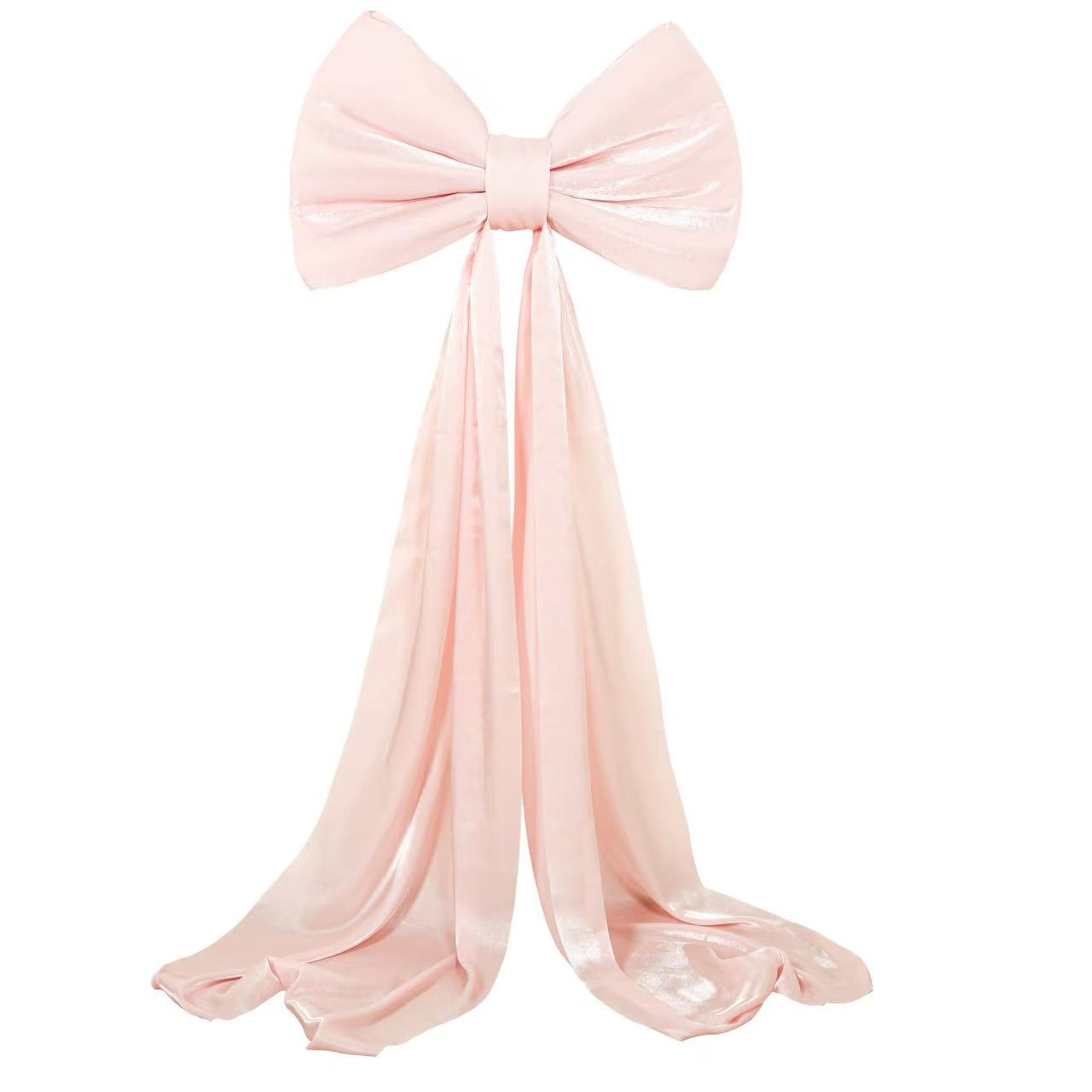 Blush pink giant bow tie décor for wedding and event backdrops.