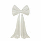 Giant white bow tie décor for wedding and event photo booths.