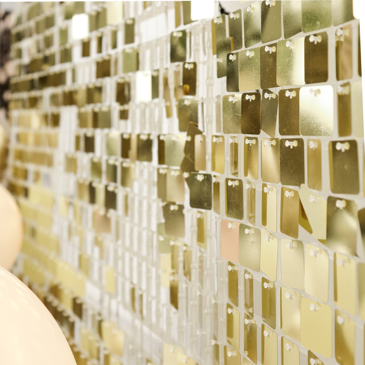Shiny gold sequin shimmer wall backdrop with 24 panels for party décor.