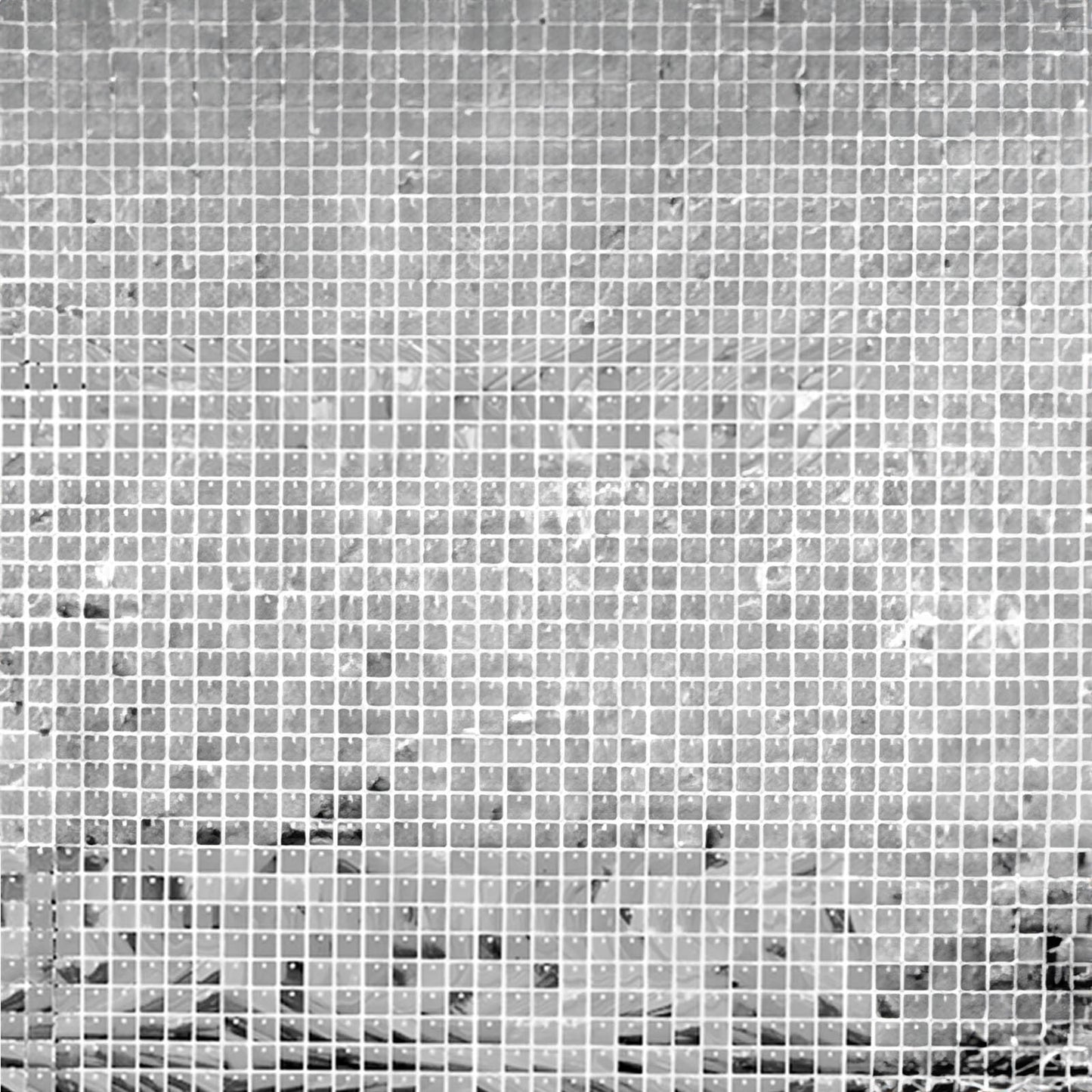 Shiny silver sequin wall backdrop for parties and photo displays.
