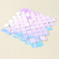 Iridescent blue sequin wall backdrop with mermaid scales pattern.