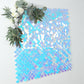 Shiny iridescent blue sequin shimmer wall backdrop with mermaid scales pattern.