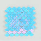 Iridescent blue sequin backdrop with mermaid scales pattern.