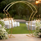 Gold double-curved metal arch frame for event display and decoration.