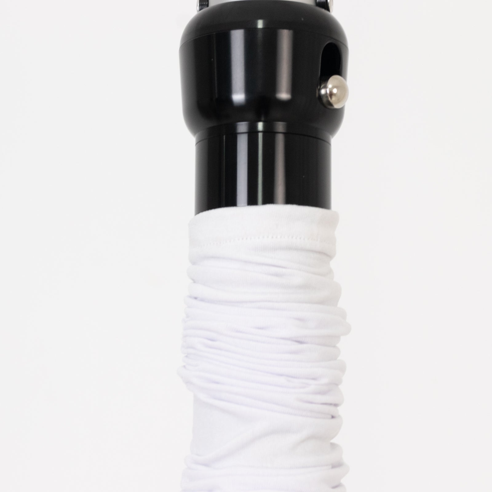 White spandex pole cover for event setup and lighting use.