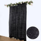 Black metallic fringe drapery panel with shimmery tinsel effect.