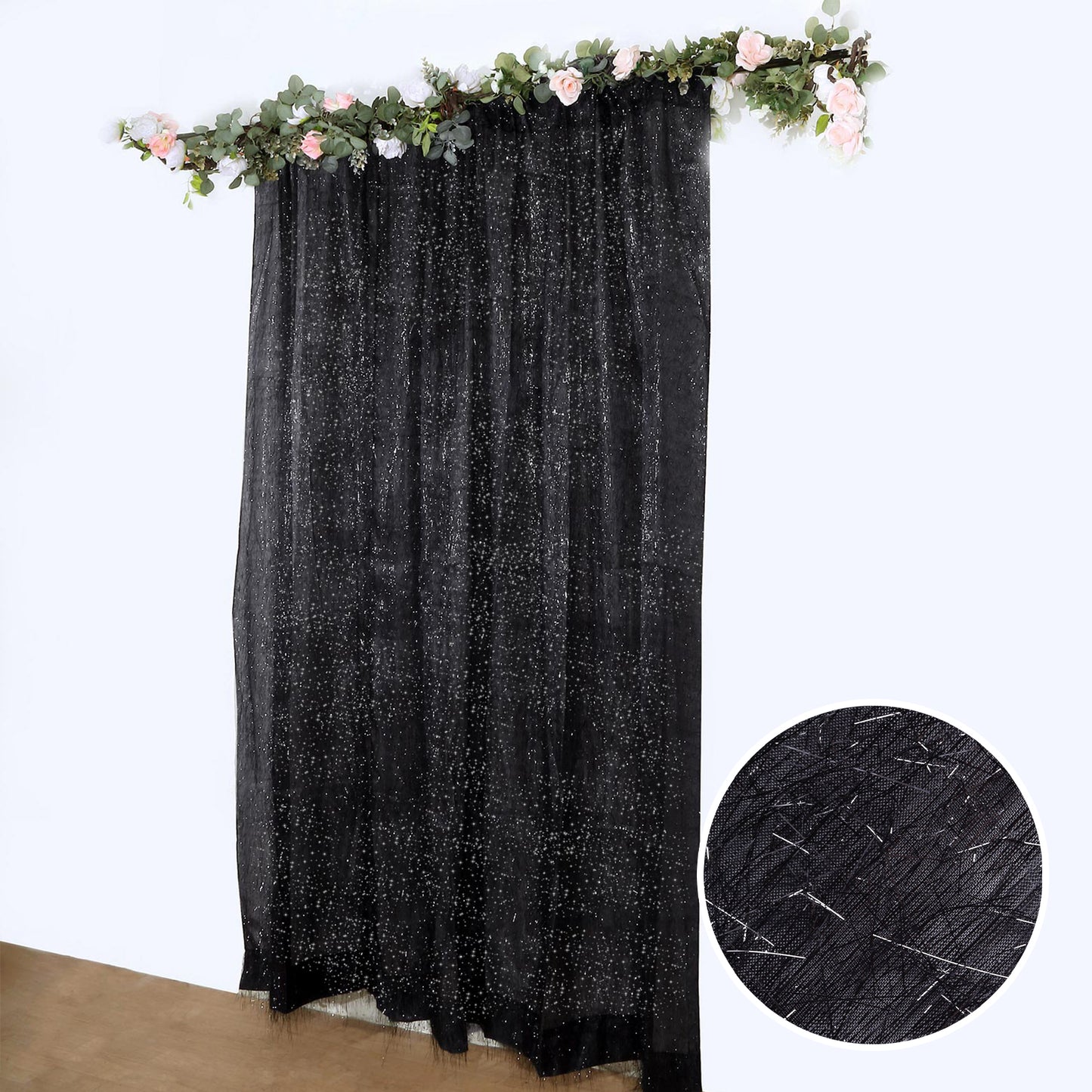 Black metallic fringe drapery panel with shimmery tinsel effect.