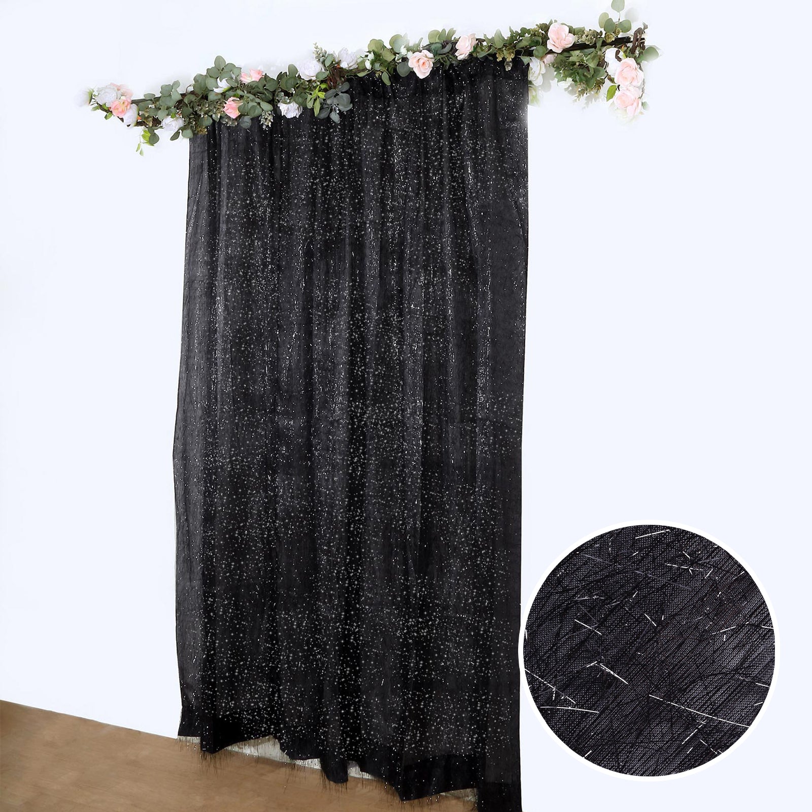 Black metallic fringe drapery panel with shimmery tinsel effect.