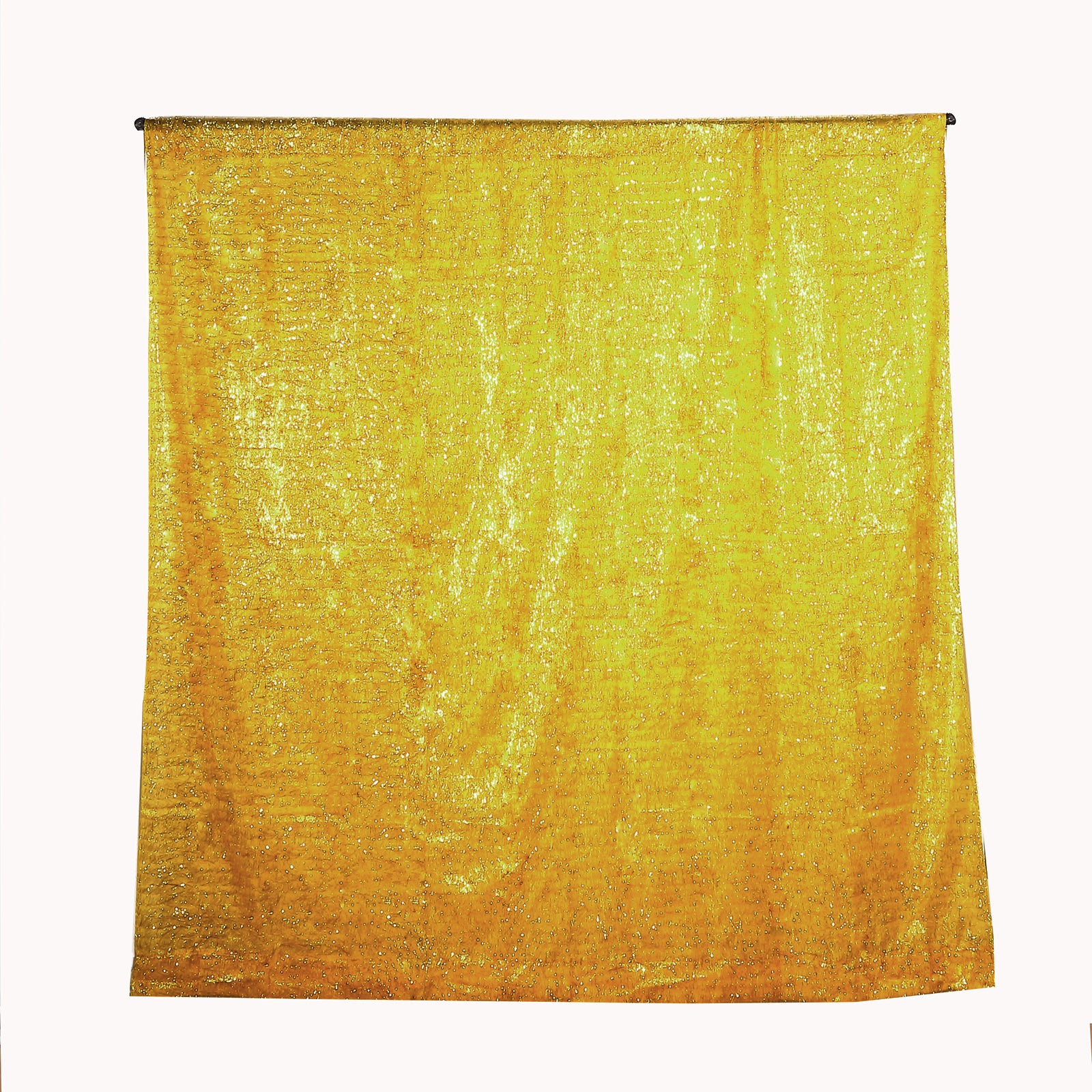 Gold metallic fringe backdrop curtain for events. Shimmery tinsel design.