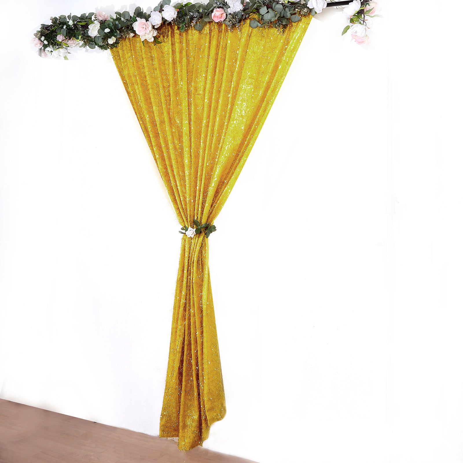 Gold metallic fringe drapery panel backdrop curtain.