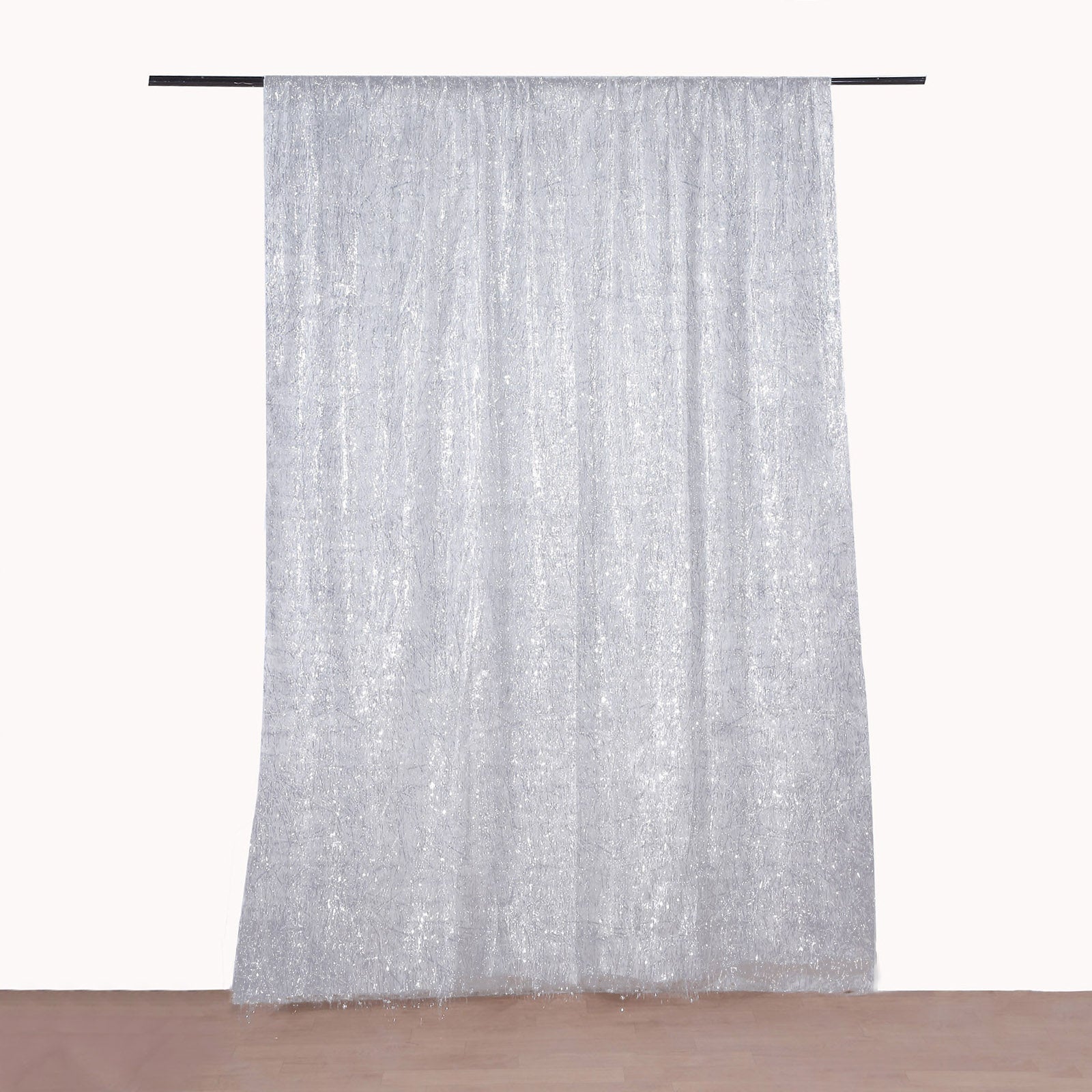 8ft silver metallic fringe drapery panel with shimmery tinsel finish.