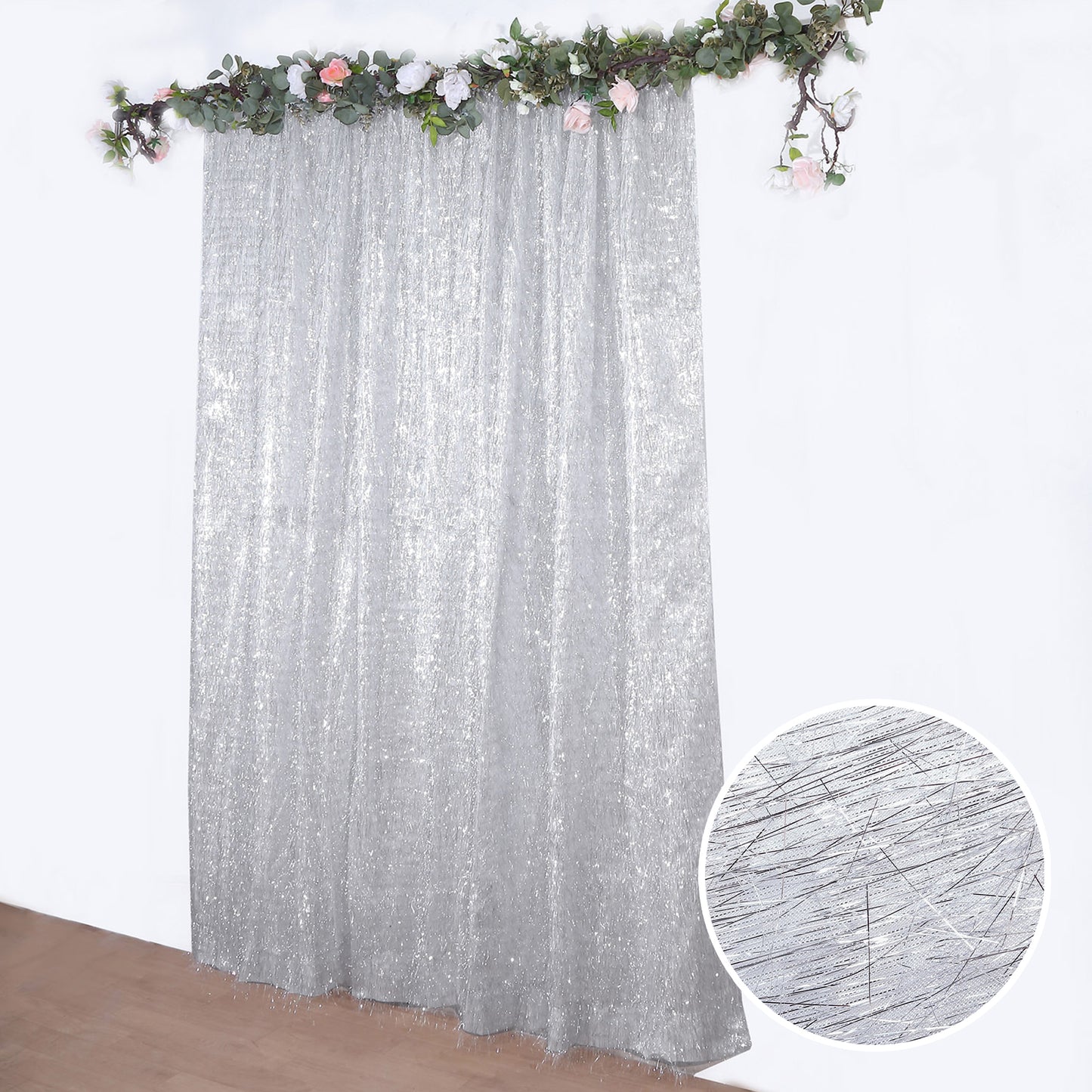 Silver metallic fringe backdrop curtain for events.