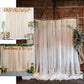 Black sheer tulle event curtain drapes with satin header, rod ready backdrop.