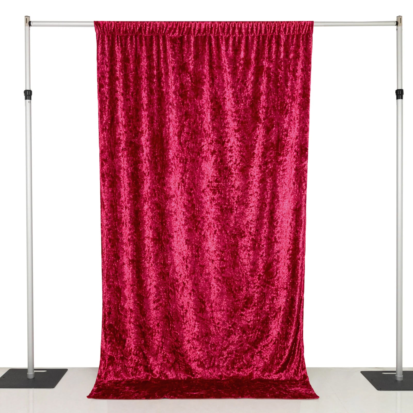 Red crushed velvet backdrop curtain for events and photo booths.