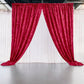 Red crushed velvet backdrop curtain for events and photo booths.