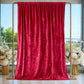 Red crushed velvet backdrop curtain for events and photo booths.