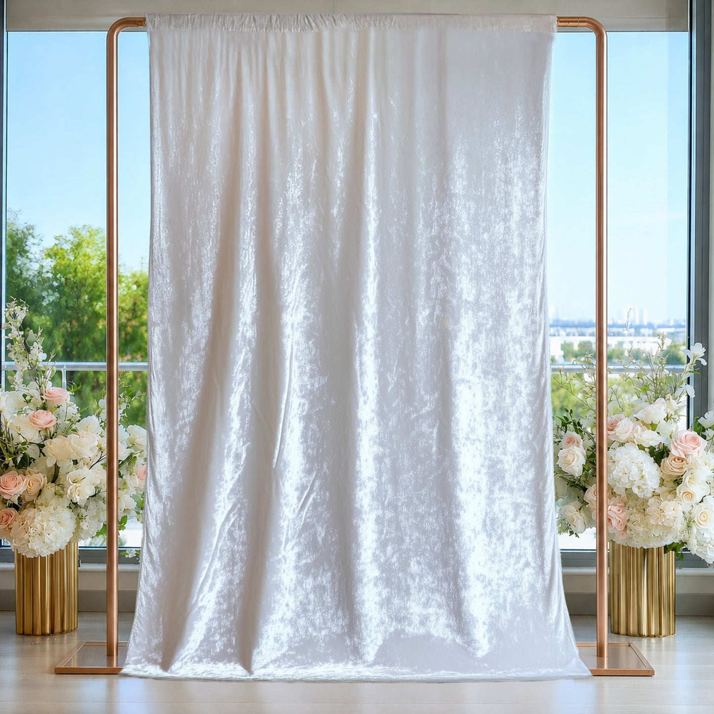 White crushed velvet backdrop curtain for events and photo booths.