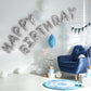 Shiny metallic silver letter and number balloons for a birthday celebration.