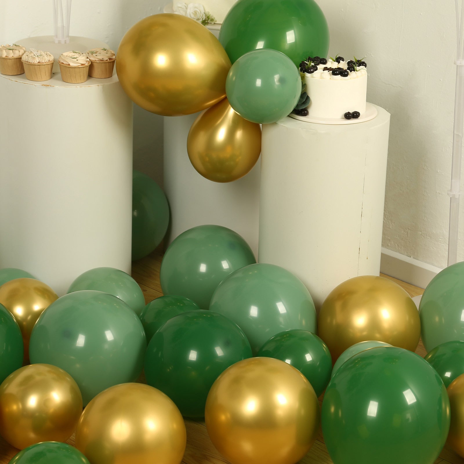 Gold and green biodegradable balloon arch kit for eco-friendly celebrations.