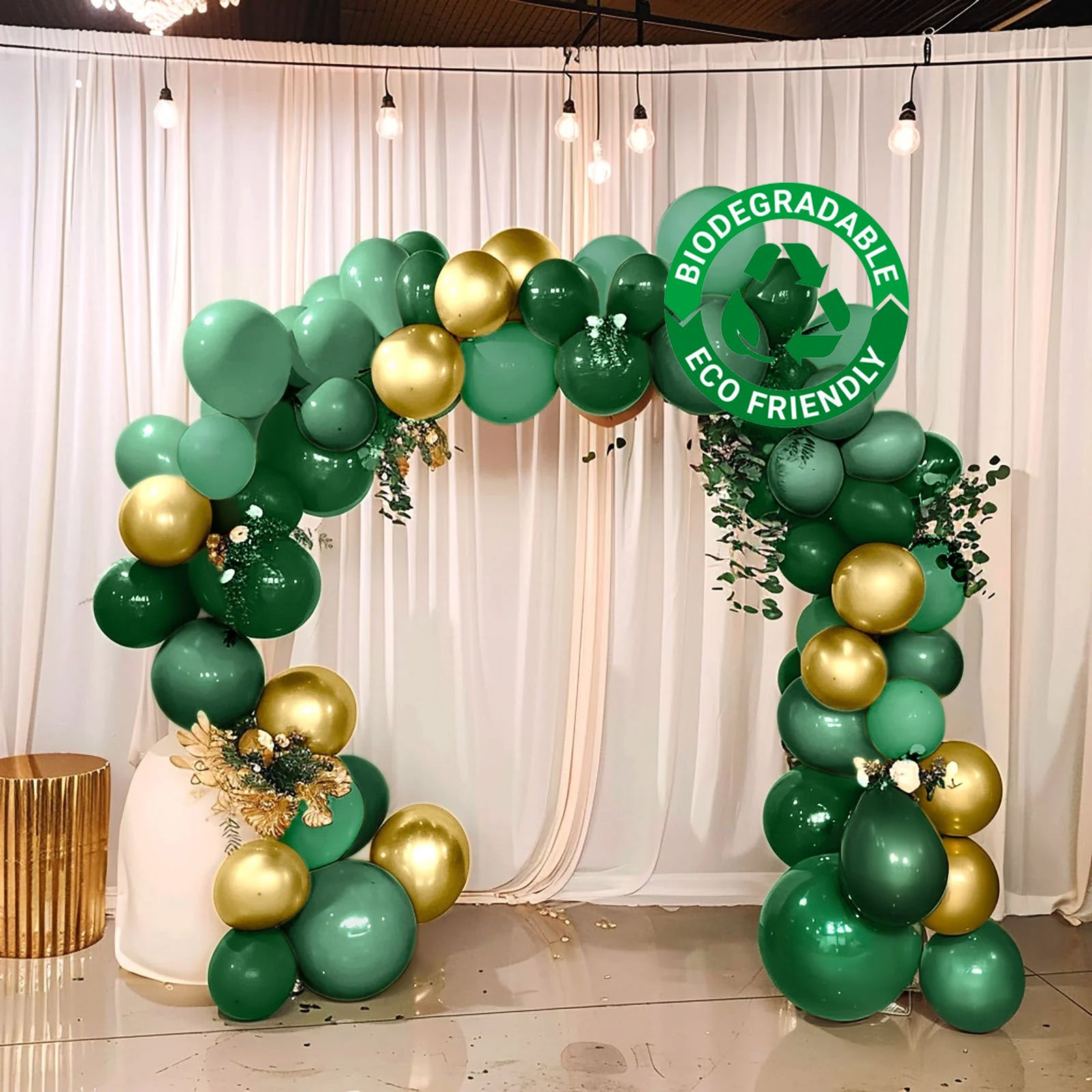 Gold and green biodegradable balloon arch kit for eco-friendly celebrations.