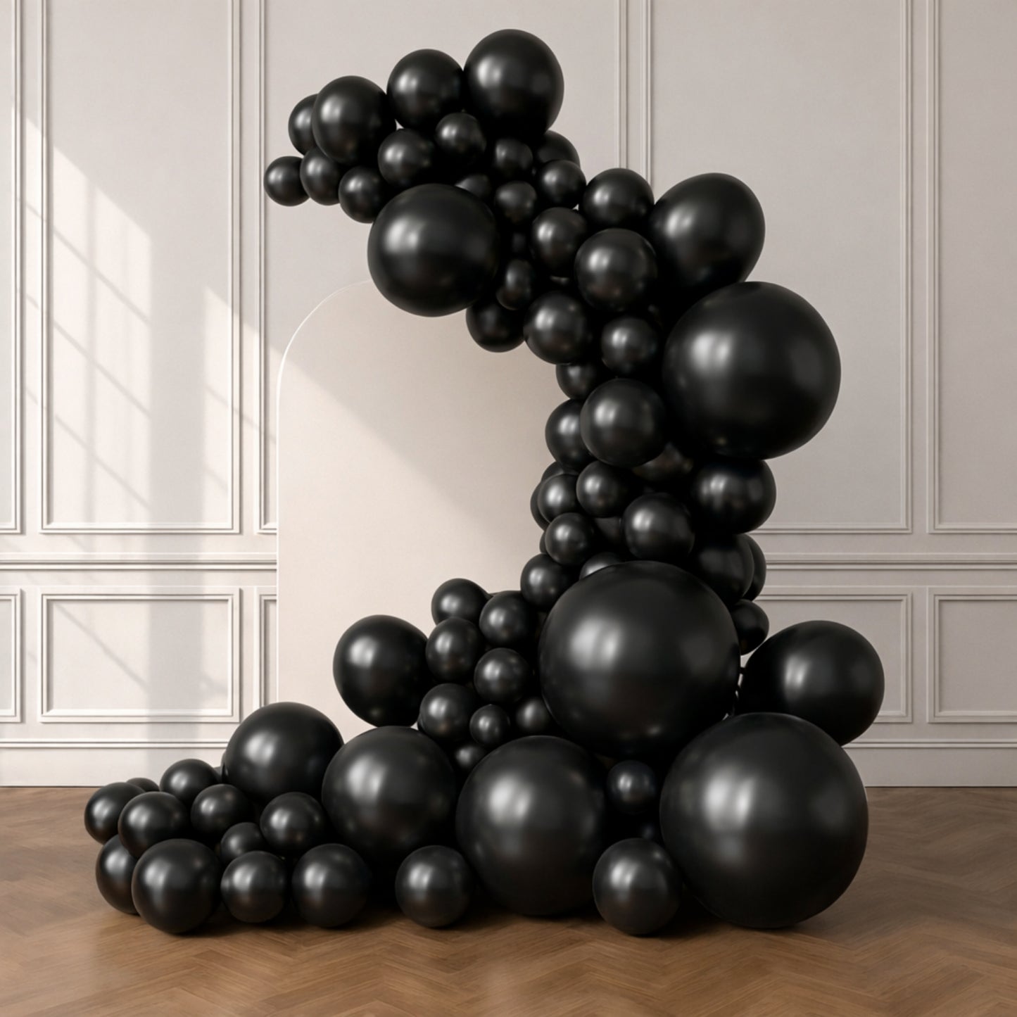 Set of 110 black biodegradable latex balloons for party arch décor. #whtbkgd