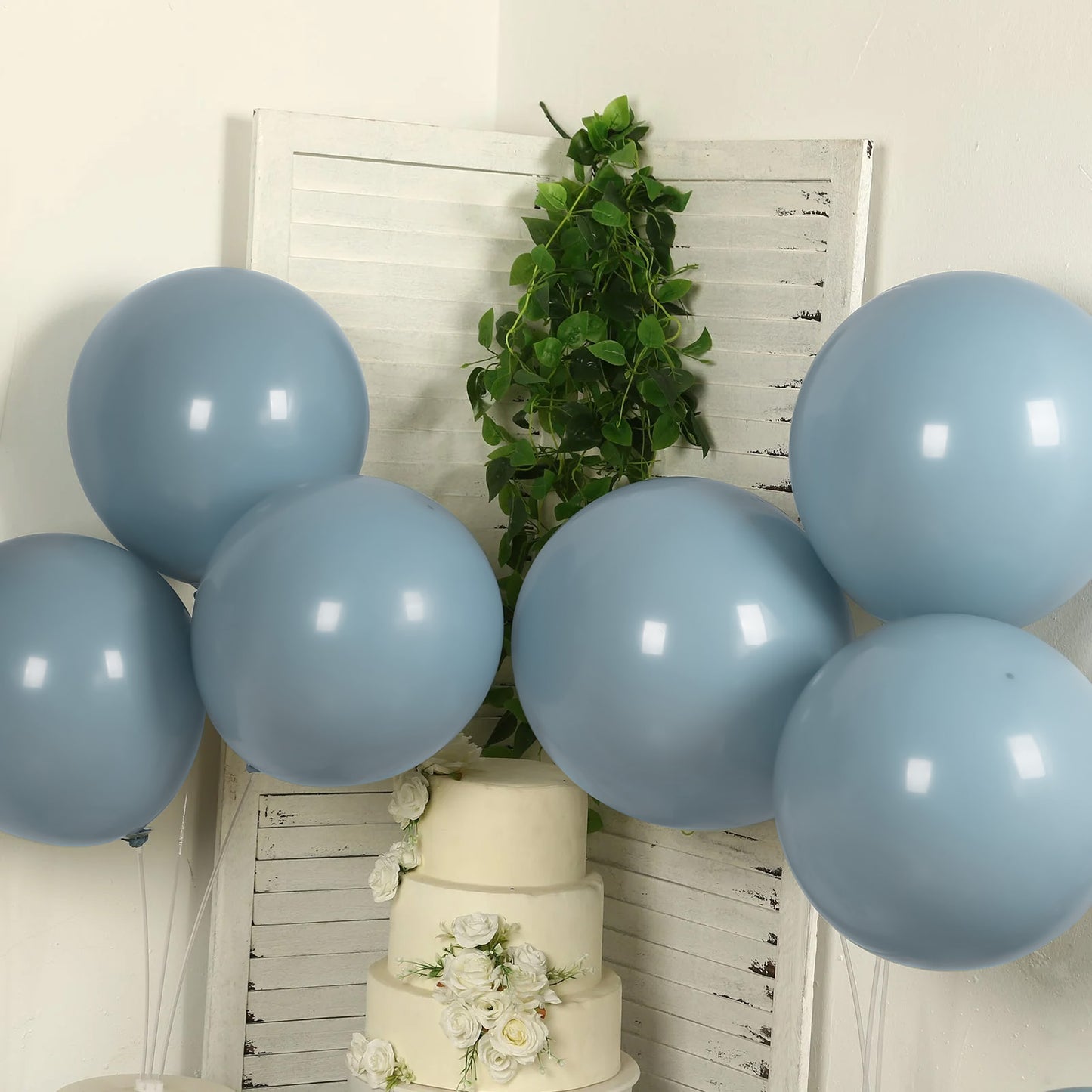 Matte pastel dusty blue biodegradable balloons for eco-friendly parties.