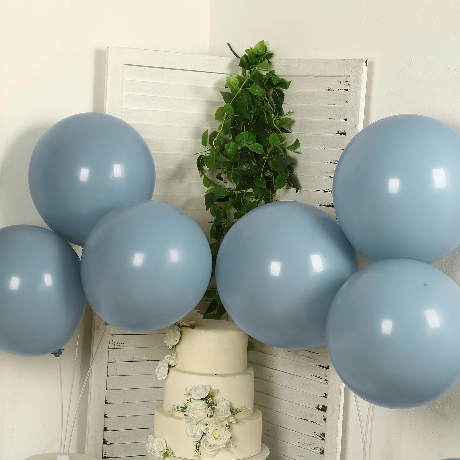 Matte pastel dusty blue biodegradable balloons for eco-friendly parties.