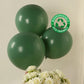 Matte pastel dusty sage green biodegradable balloons, eco-friendly party decor.