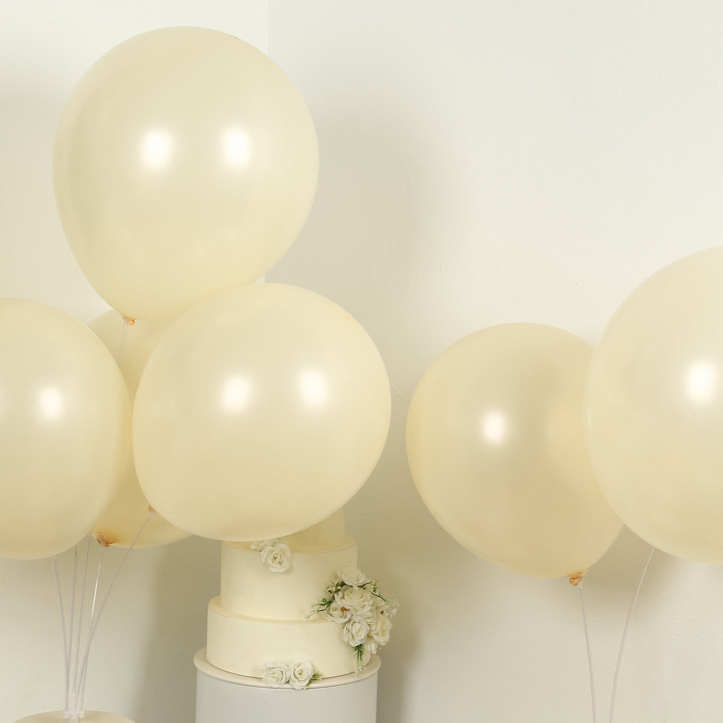 Matte pastel cream biodegradable balloons on display for a party.
