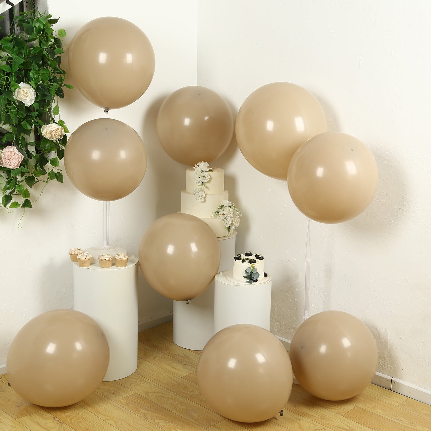 Matte pastel taupe biodegradable balloons in a party setting.