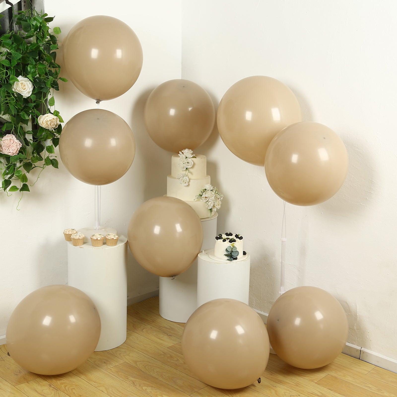 Matte pastel taupe biodegradable balloons in a party setting.