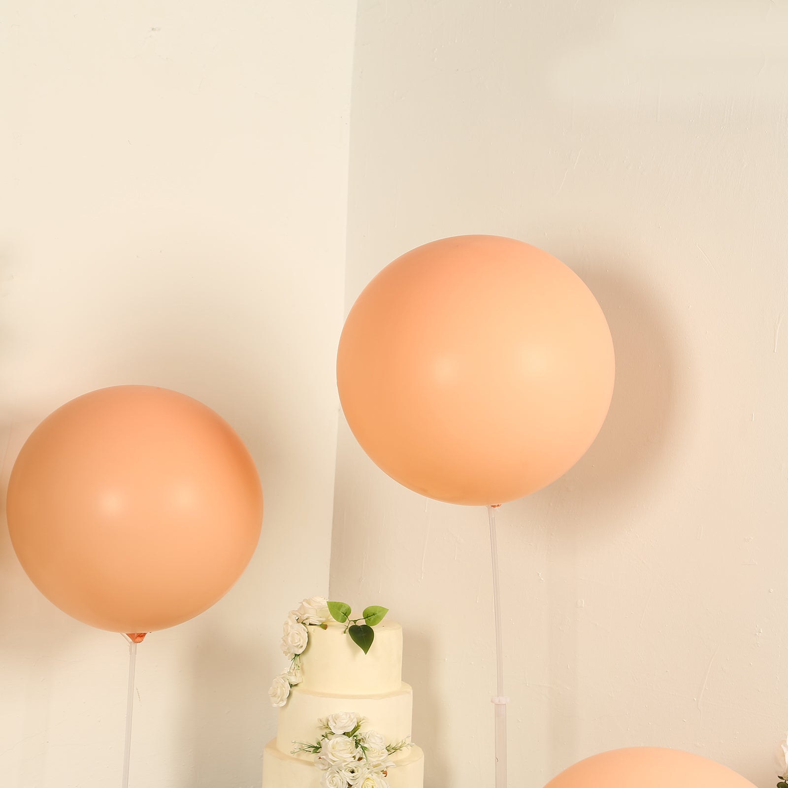Large peach biodegradable balloon for eco-friendly celebrations.
